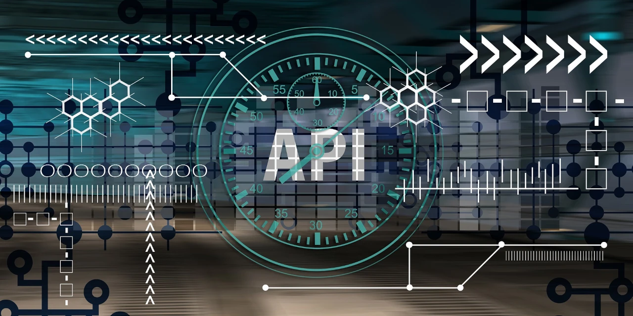 Grafica rappresentante le API con simboli tecnici, esagoni, nodi e un timer al centro, simboleggiando la tecnologia e il futuro.